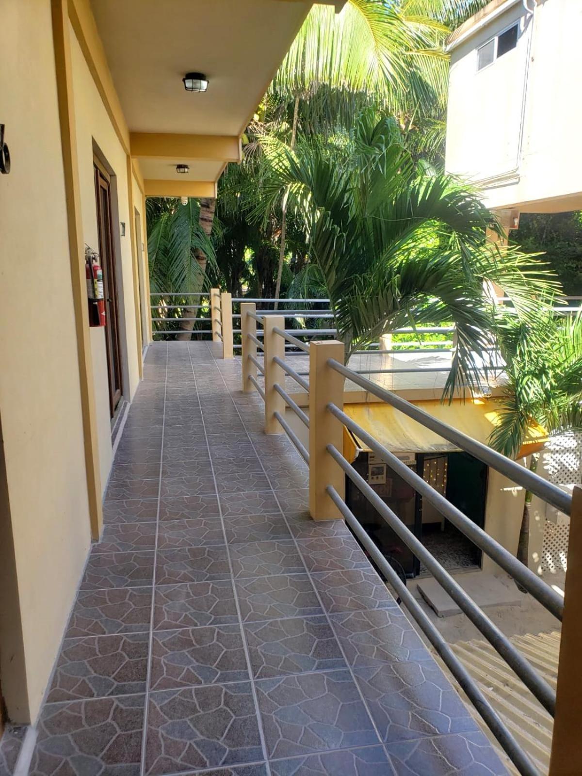 Beach Club Budget Rooms At Popeyes Caye Caulker Bagian luar foto