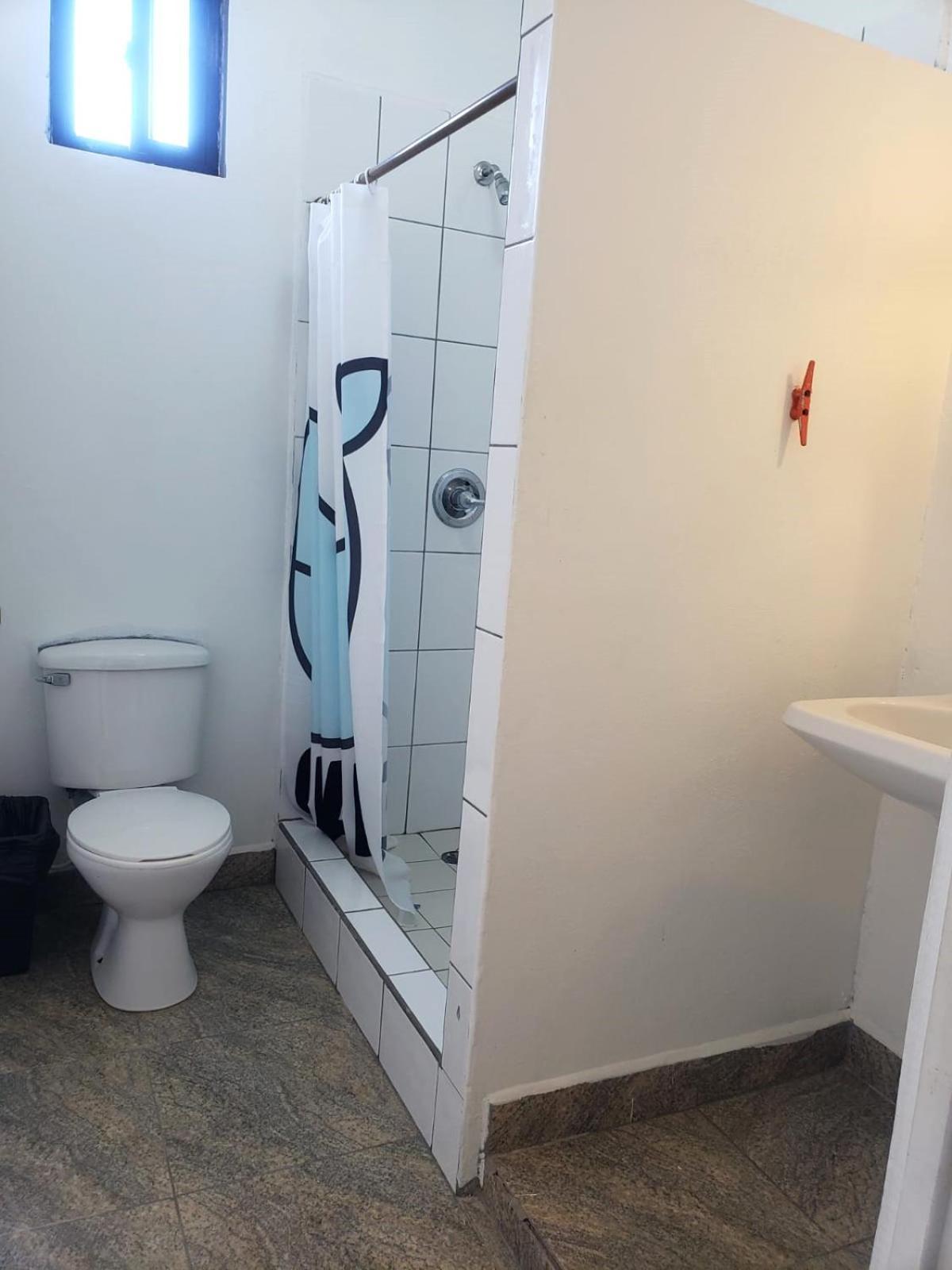 Beach Club Budget Rooms At Popeyes Caye Caulker Bagian luar foto